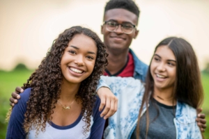 A group of three teen friends
